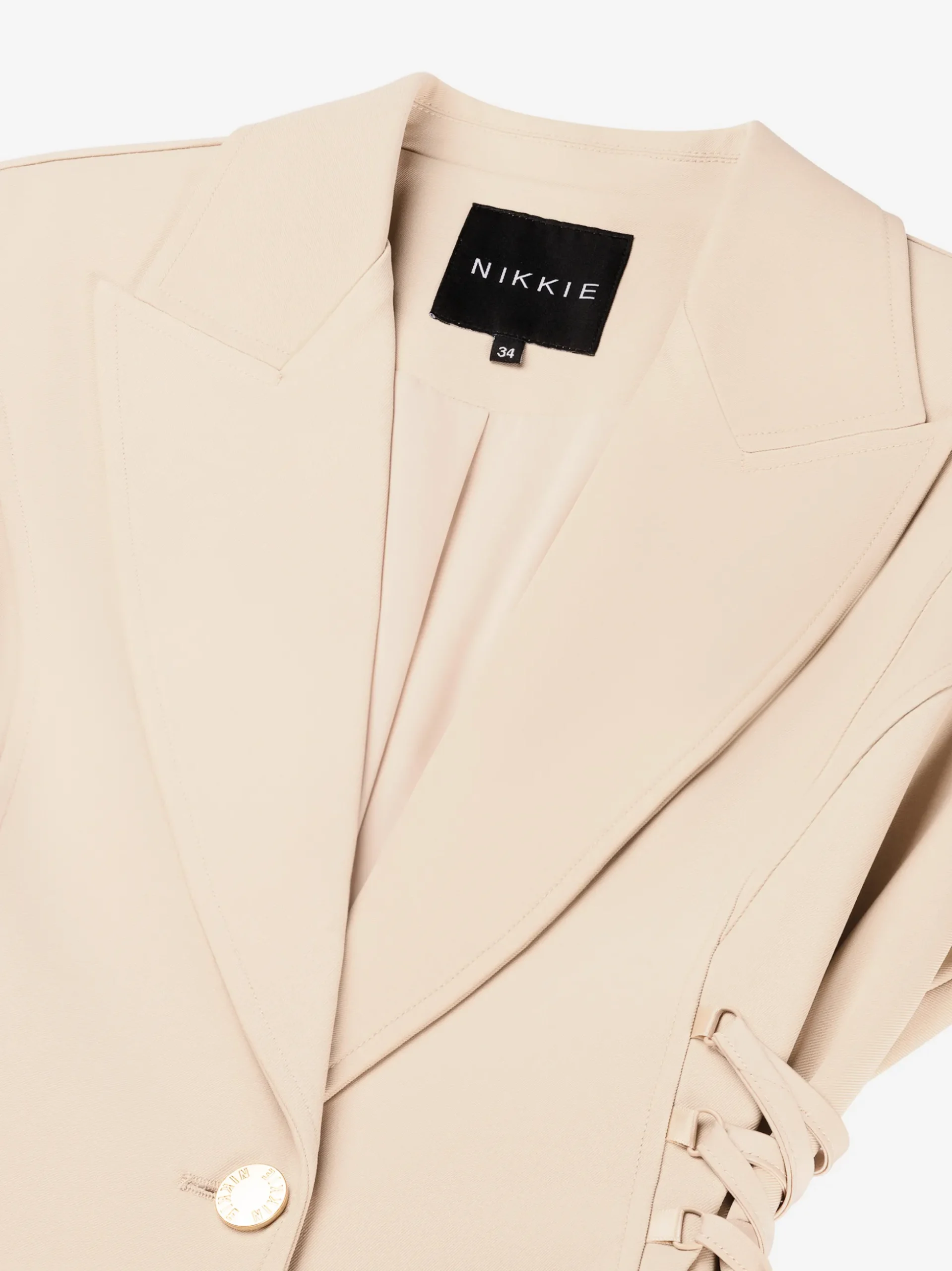Aansluitende blazer met veter details