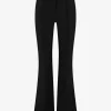 Aansluitende flared pantalon met naden en N-knopen