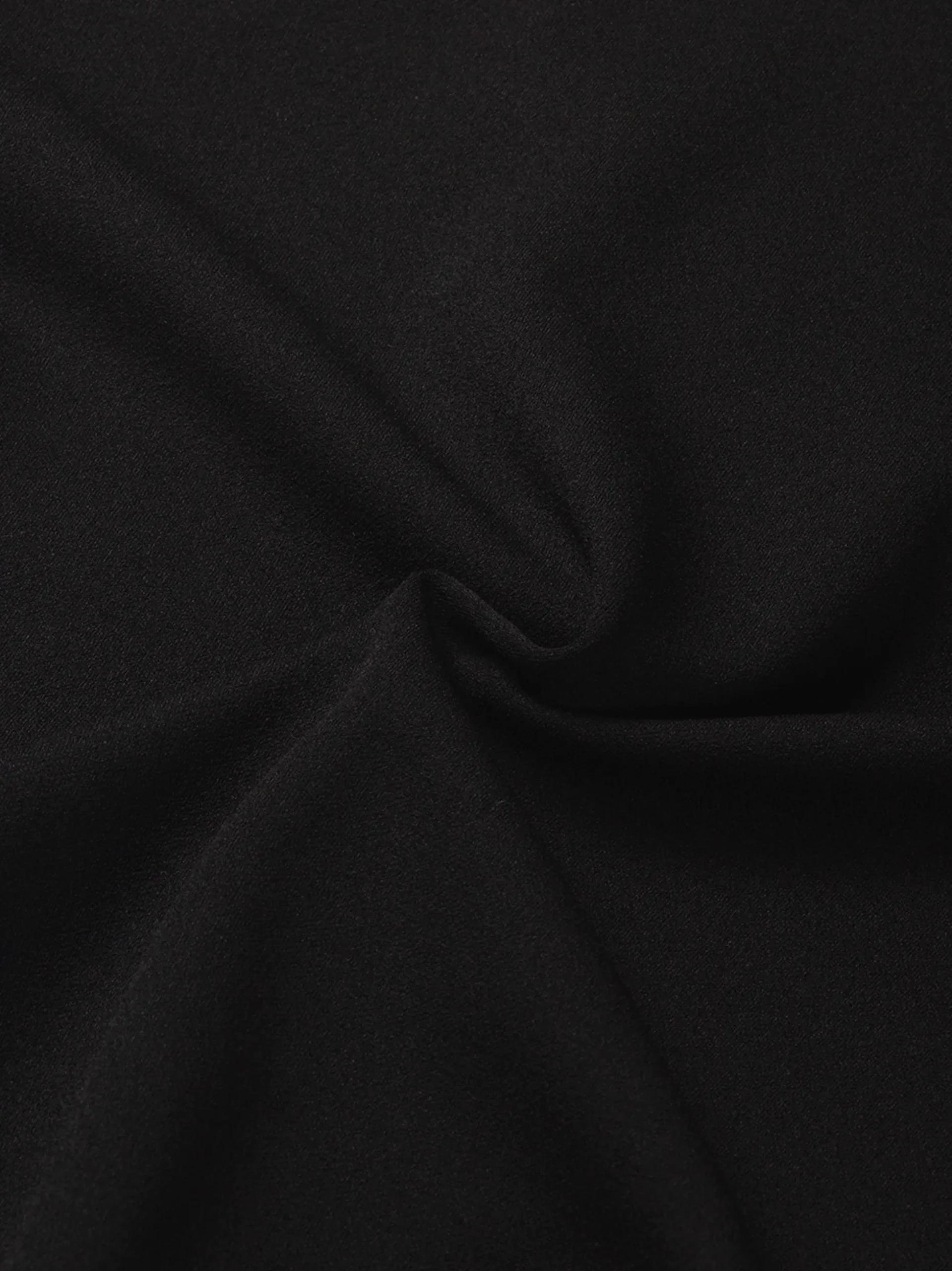 Aansluitende top met ketting detail