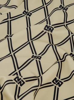 Aansluitende top met N&N logo patroon