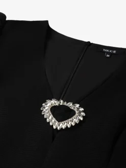 Aansluitende top met pofmouwen en strass detail