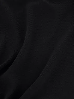 Aansluitende top met rits detail