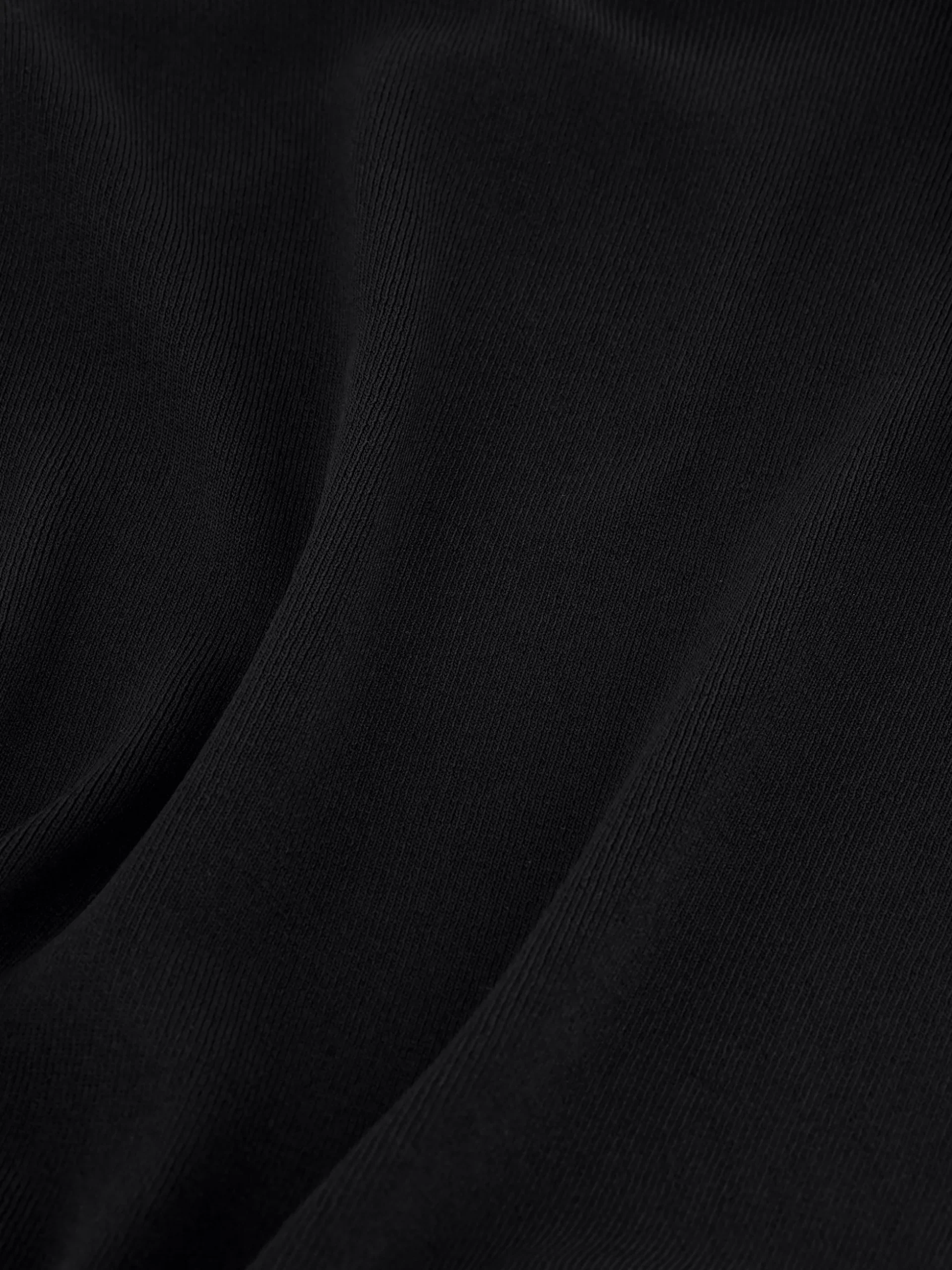 Aansluitende top met rits detail