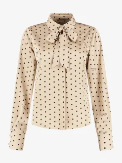 Blouse met stippen en strikkoord
