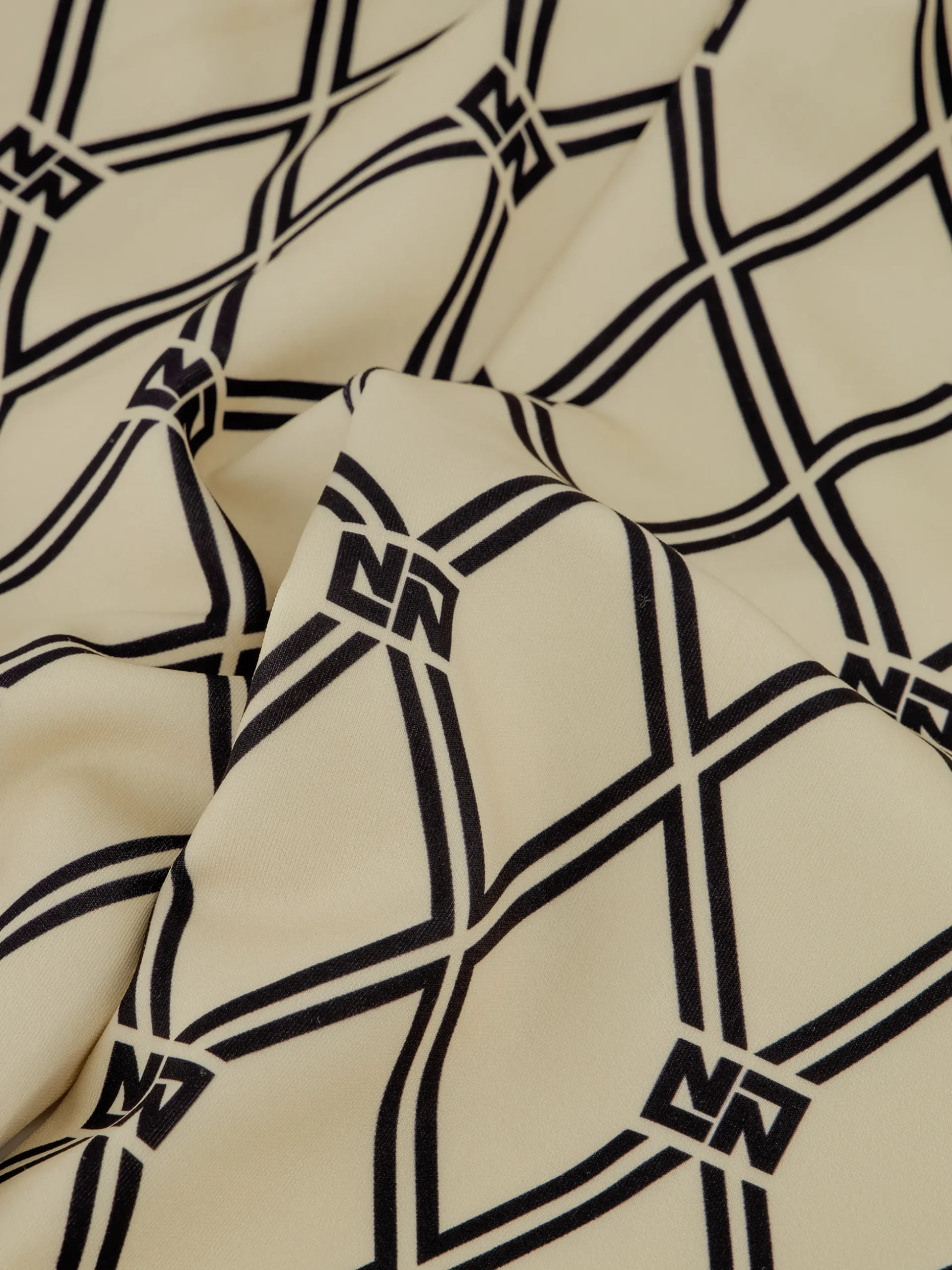 Flared broek met N&N logo patroon