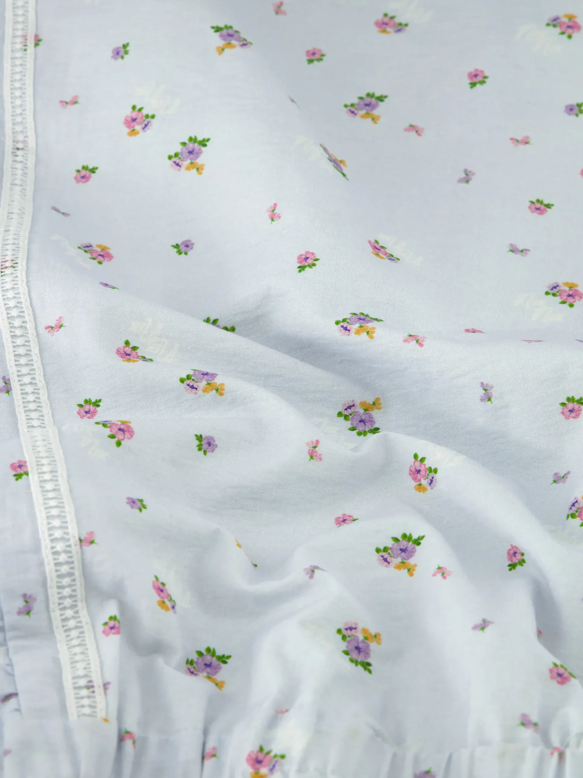 Gelaagde jurk met bloemenprint en ruches
