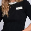 Geribbelde top met gevlochten en gestreepte details