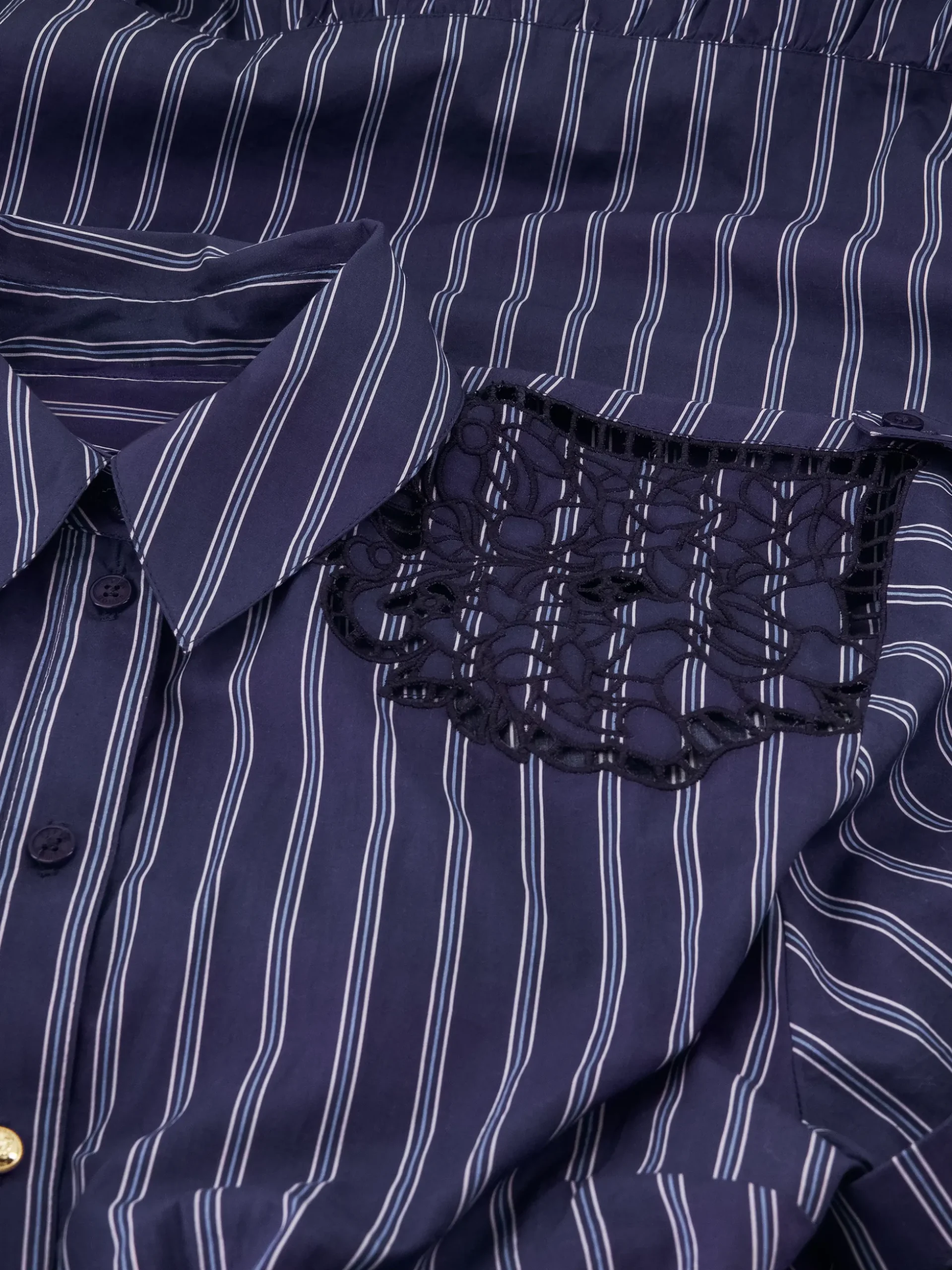 Gestreepte blouse met kanten cut-out details