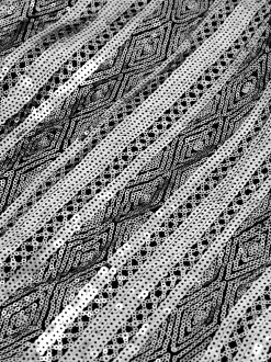 Jack met pailletten en gevlochten randen