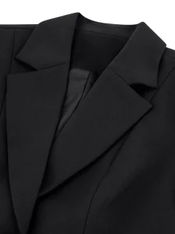 Klassieke blazer met N-knoop en reverskraag