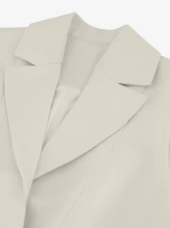 Kort gilet met overslag en N-knopen