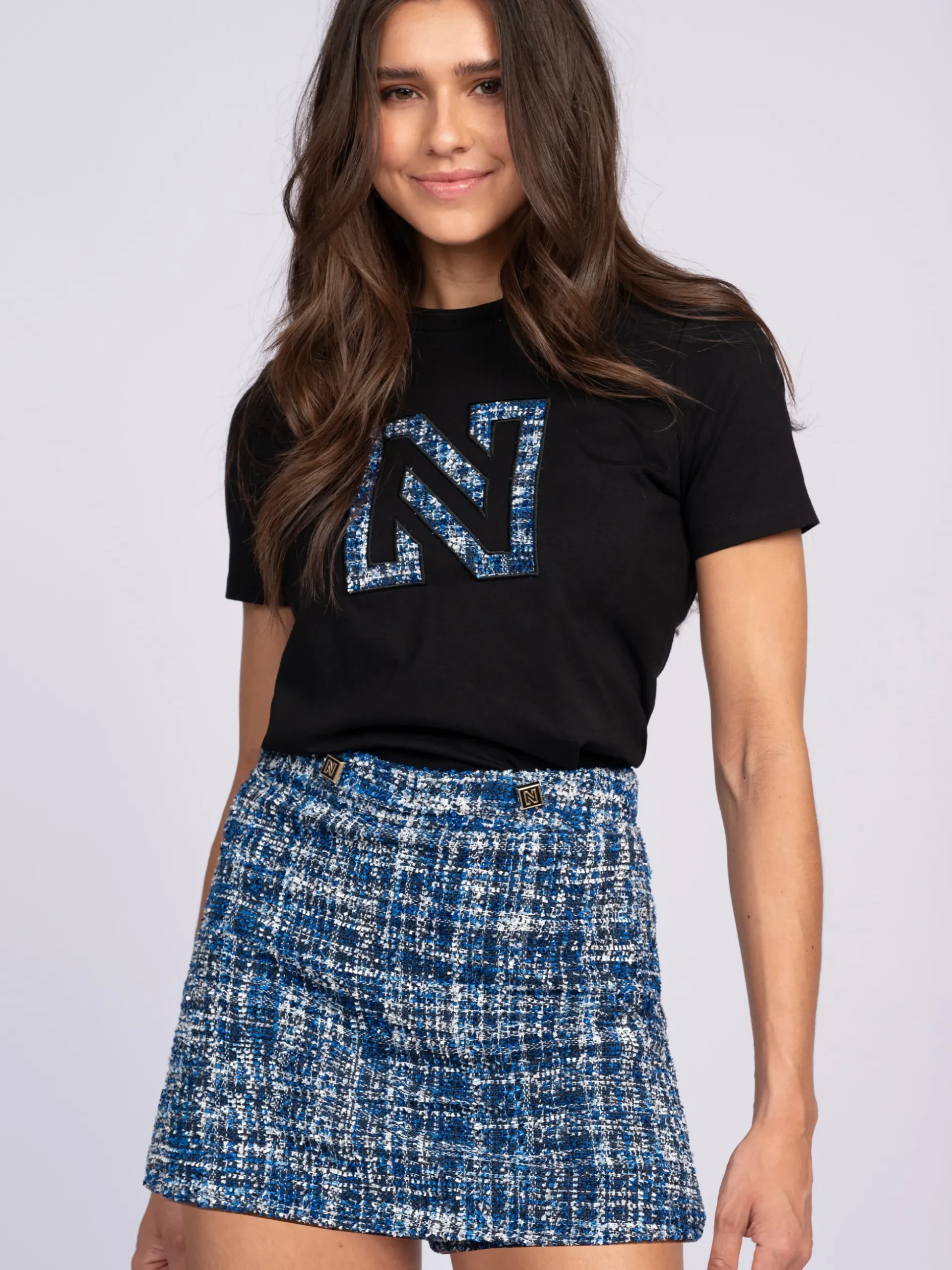 Korte aansluitende skort van tweed