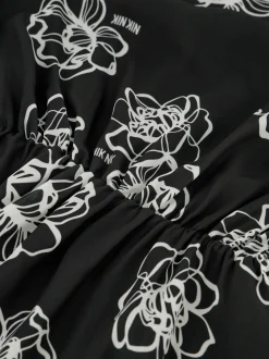 Korte jurk met bloemenprint en logo details