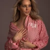 Losvallende gestreepte blouse met geborduurd logo