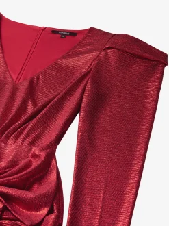 Metallic jurk met pofmouwen en strik detail
