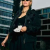 Oversized bomber jack met pailletten en geplooide mouwen