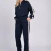 Pantalon met strepen en knopen op zijkant
