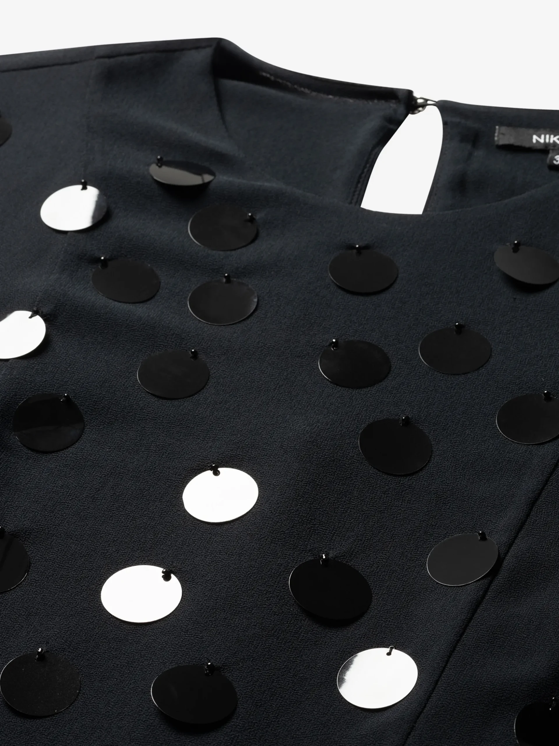 Playsuit met pailletten en een strikkoord