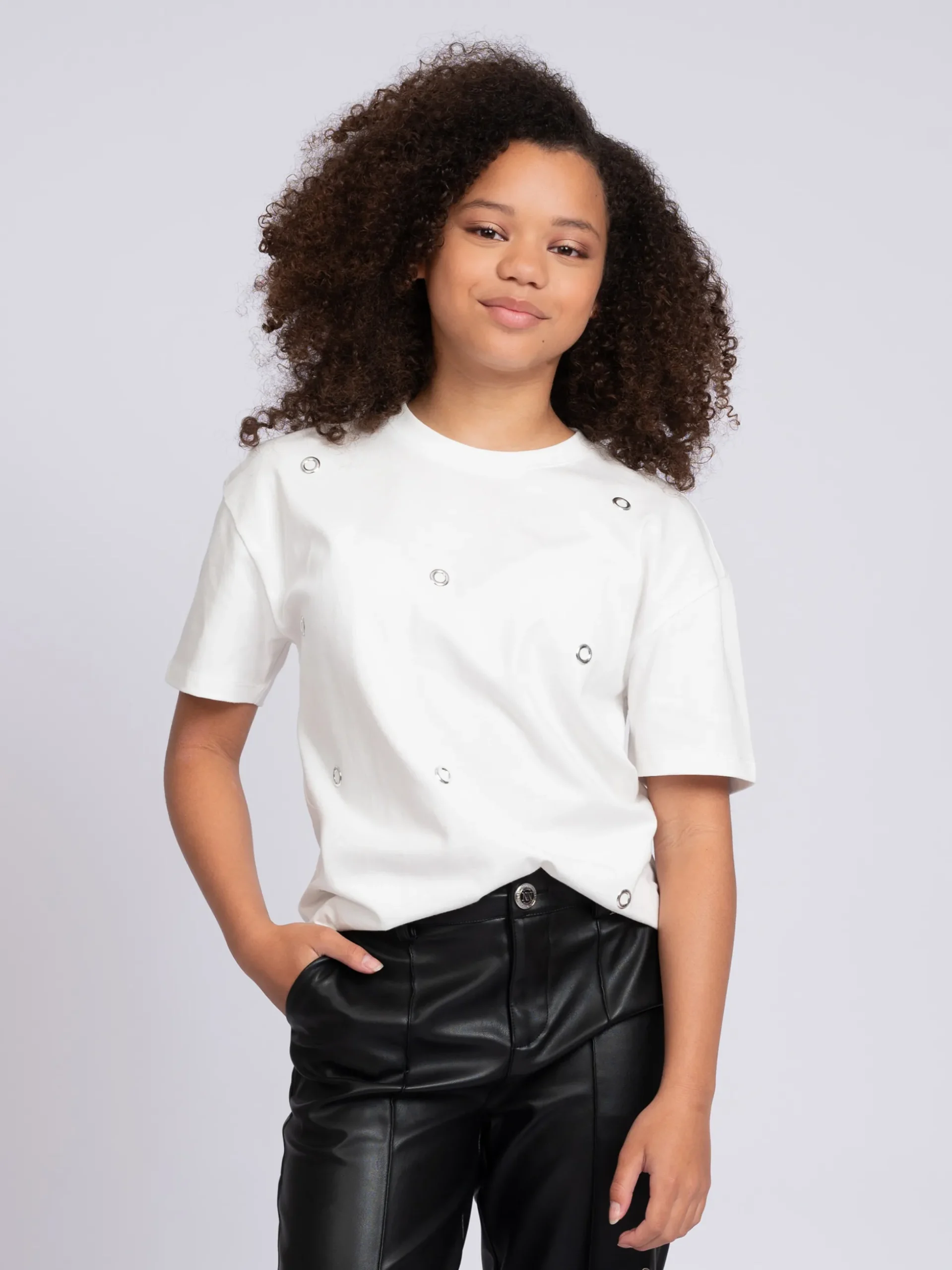 T-shirt met decoratieve ringetjes